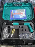 Powder nail gun kit contents — gun, spare springs, lubricating oil, safety glasses